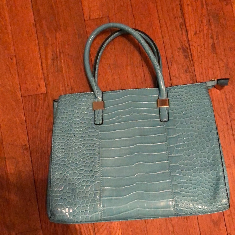 Turquoise faux alligator skin purse with red lined interior